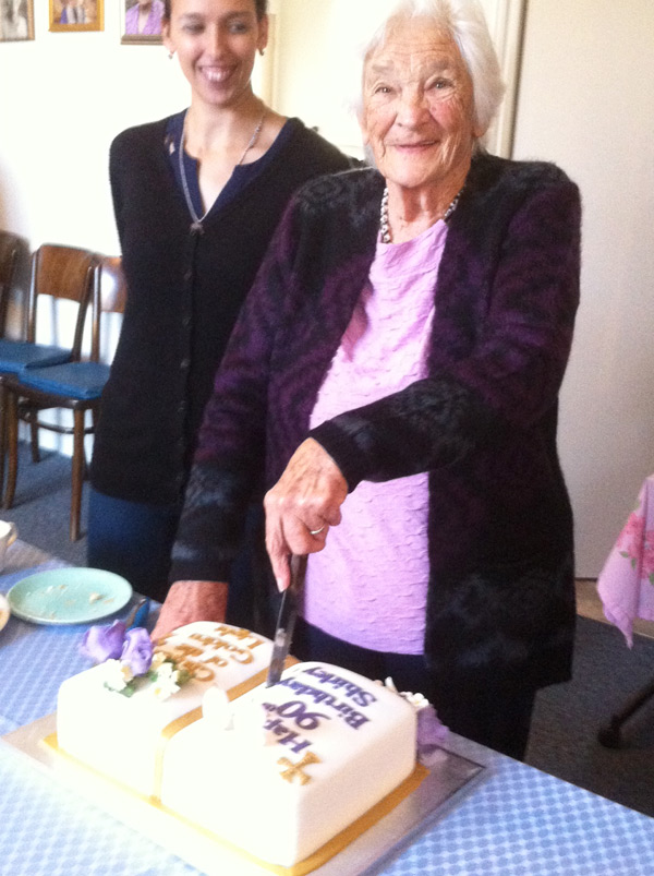Shirley Parsons cutting 90th Birthday cake